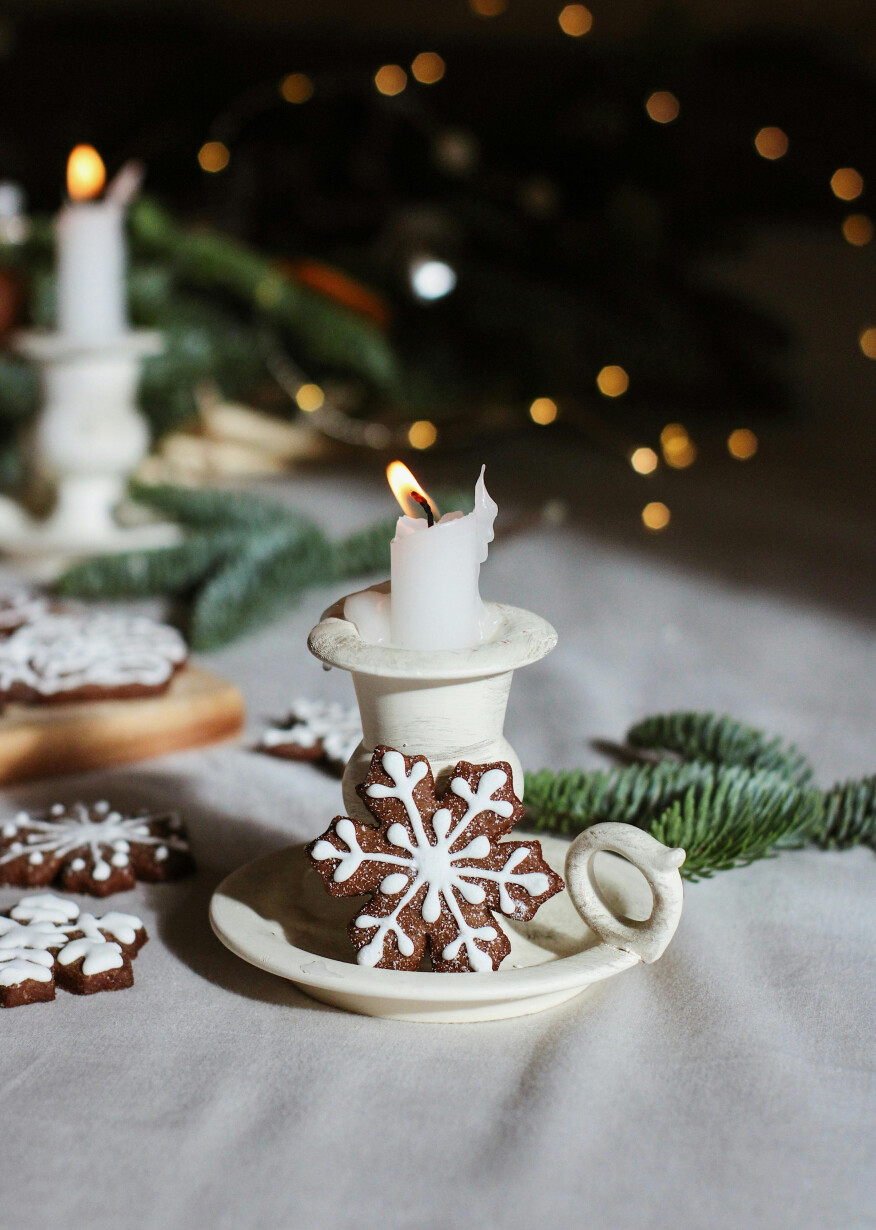 Advent candle with snowflake cookie