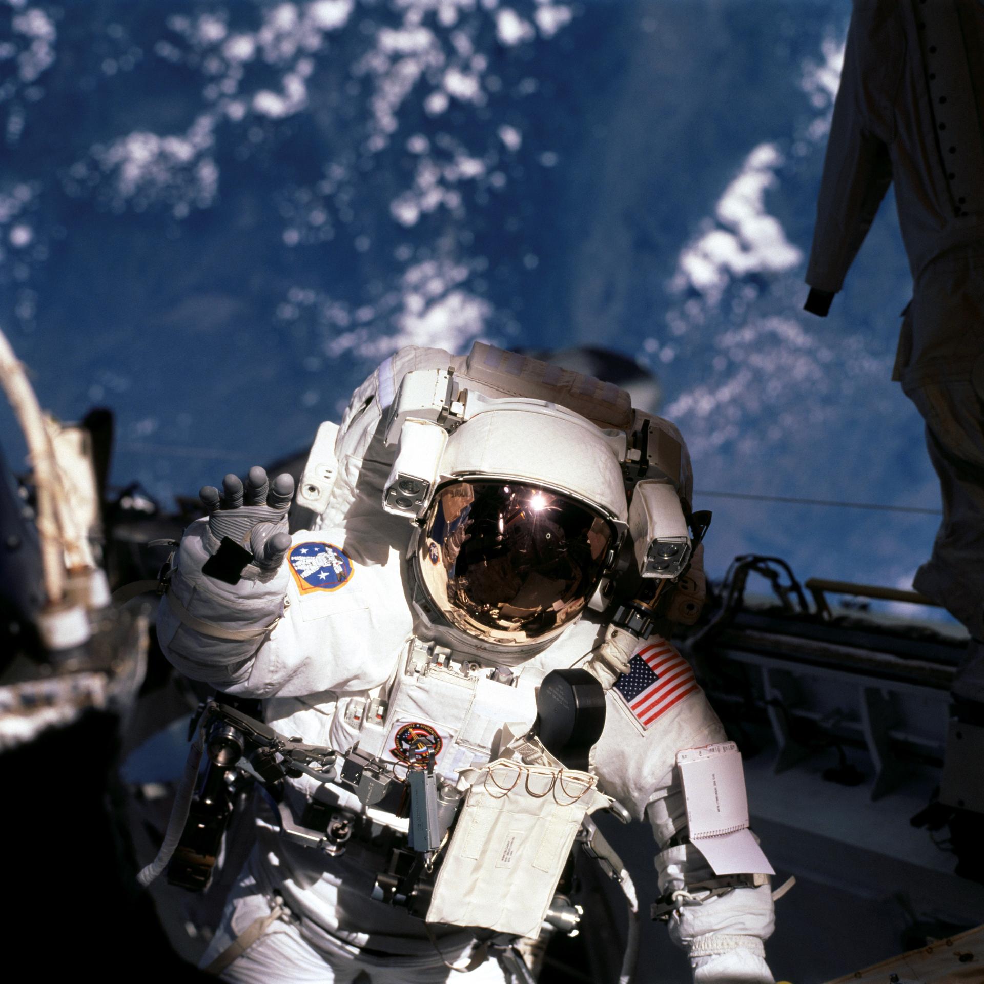 Astronaut floating in Earth's orbit