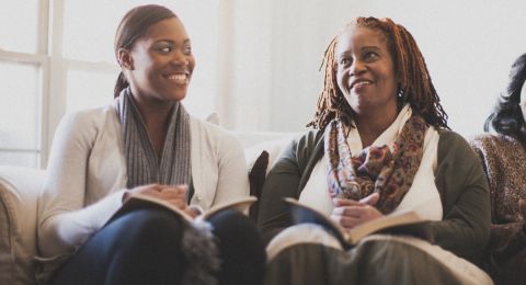 Two women studying Bible together