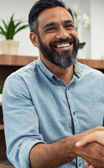 Smiling man in handshake