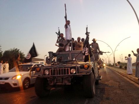 ISIS fighters in military vehicle