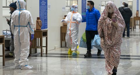 Medical staff wearing protective equipment