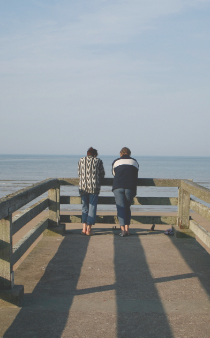 Women gazing at ocean view