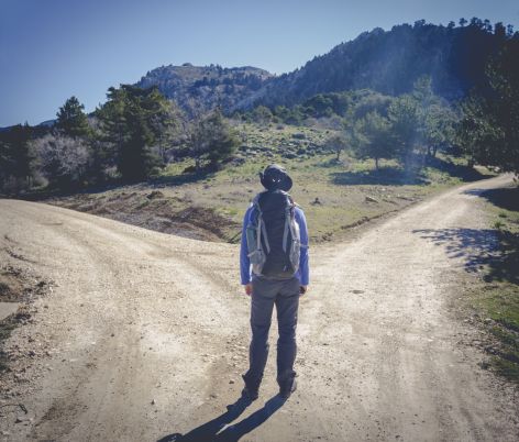 Man walking alone on rural path