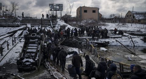 People crossing bridge in Ukraine crisis