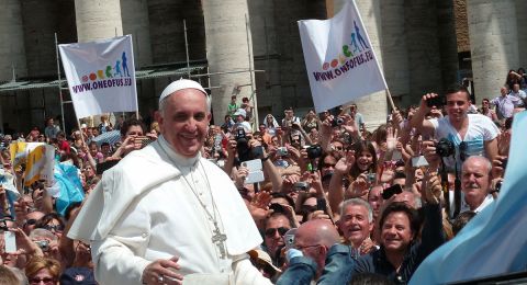 Pope Francis greeting crowd of followers