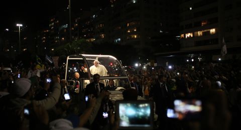 Pope in car at night